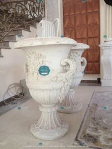 tranh phù điêu xi măng tạo điểm nhấn mặt tiền