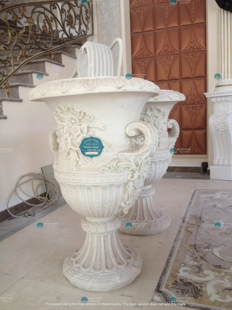 tranh phù điêu xi măng tạo điểm nhấn mặt tiền